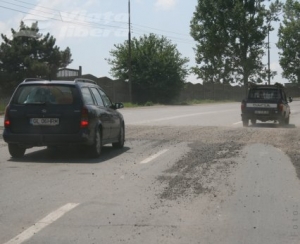 Groapă astupată, urmează asfaltul