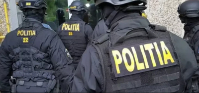 Gălățean împușcat de mascați într-un conflict domestic. A atacat agenții cu un topor