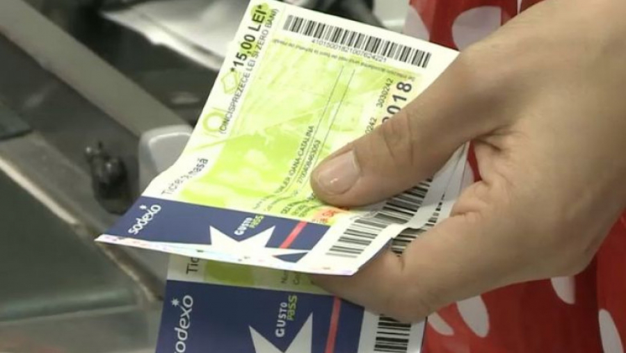Soluție pentru ca salariaților să nu li se taie bonurile de masă