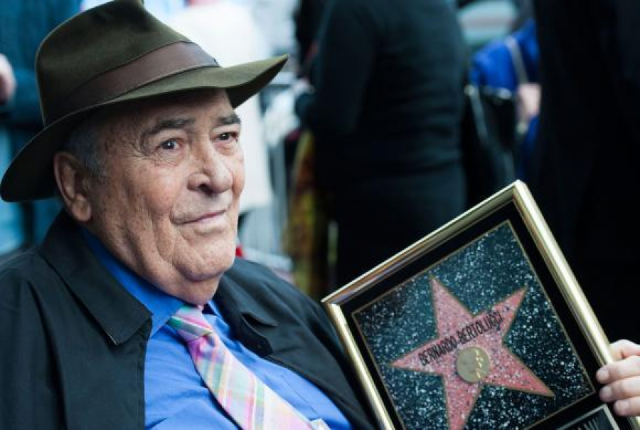 A murit cineastul Bernardo Bertolucci