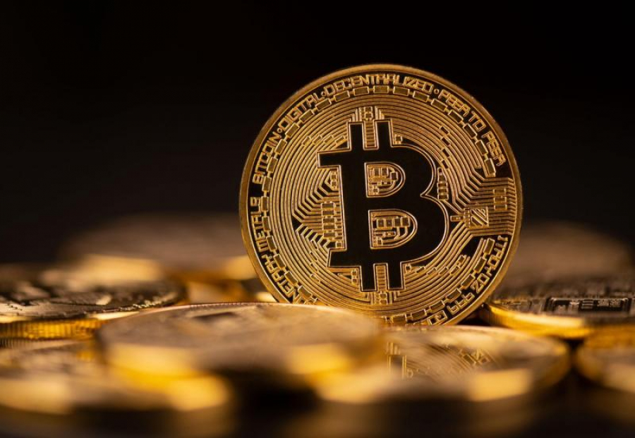 Bitcoin, în prag de 30.000 de dolari
