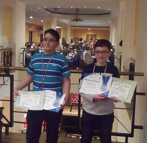 Menţiuni şi medalii de argint pentru gimnazişti. Fabian Anghel şi Alex Bârsan, PREMIAȚI la Naţionala de Informatică