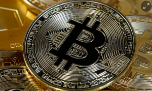 S-a înjumătățit recompensa primită de minerii de bitcoin