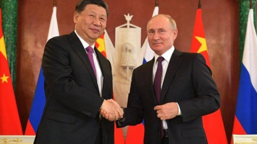 China se alătură Rusiei și se opune extinderii NATO