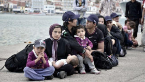 A început transferul migranţilor din Lesbos