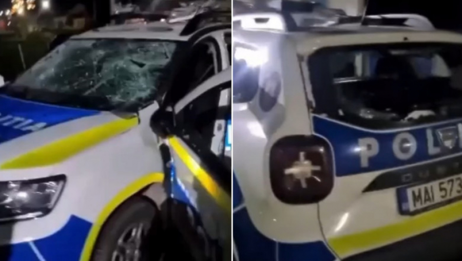 Mașină de poliție distrusă cu ciocanul de un bărbat, chiar în curtea secției (VIDEO)