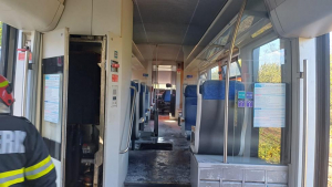 O sută de călători, într-un tren care a luat foc