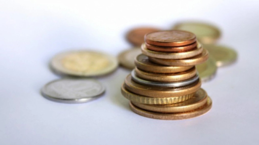 Ușoară tendință de depreciere a leului față de euro