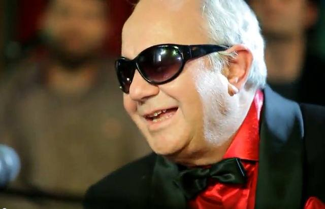 Oameni de seamă. George Nicolescu, „trubadurul orb”