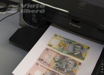 Producători de bani falşi - în arest (VIDEO)