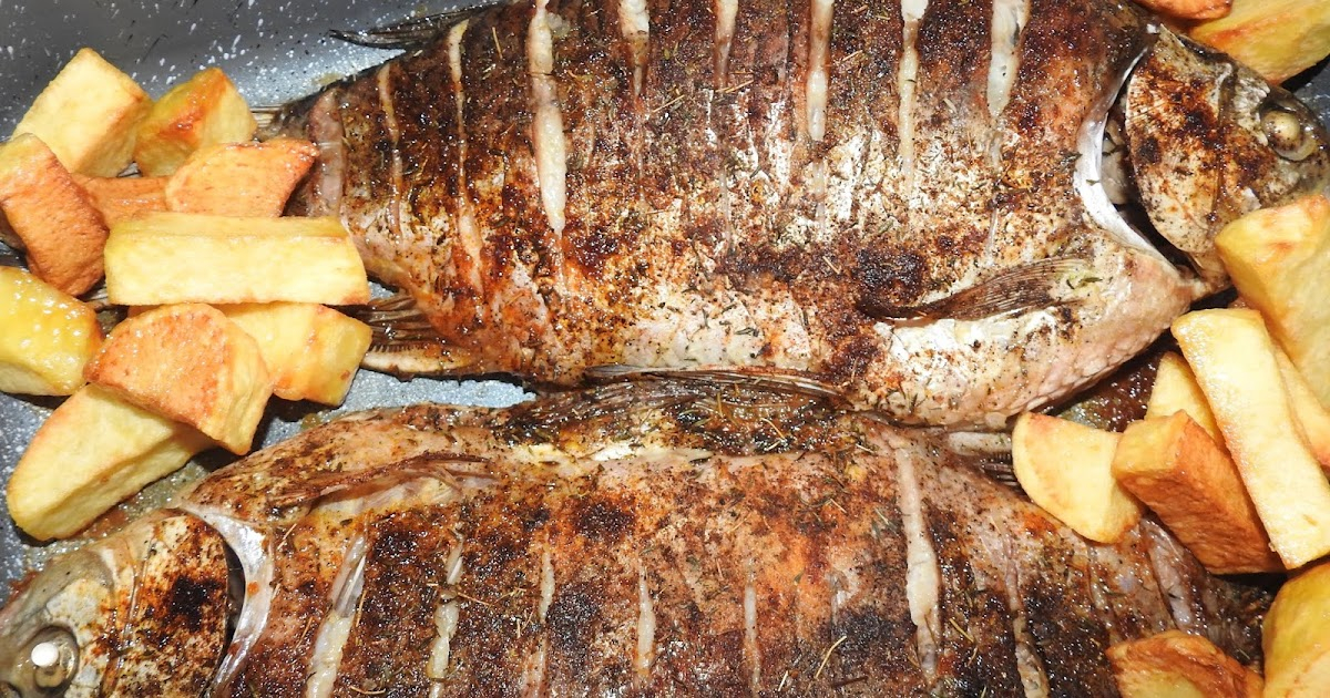 Pește întreg cu cartofi la cuptor