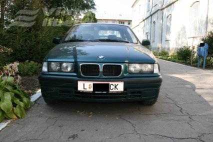 BMW în blană de oaie şi numere de Chrysler