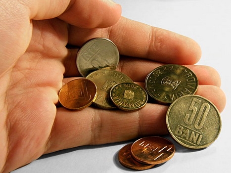 Românii sunt la fel de pesimişti ca în 2013 privind redresarea economiei şi veniturile în 2014