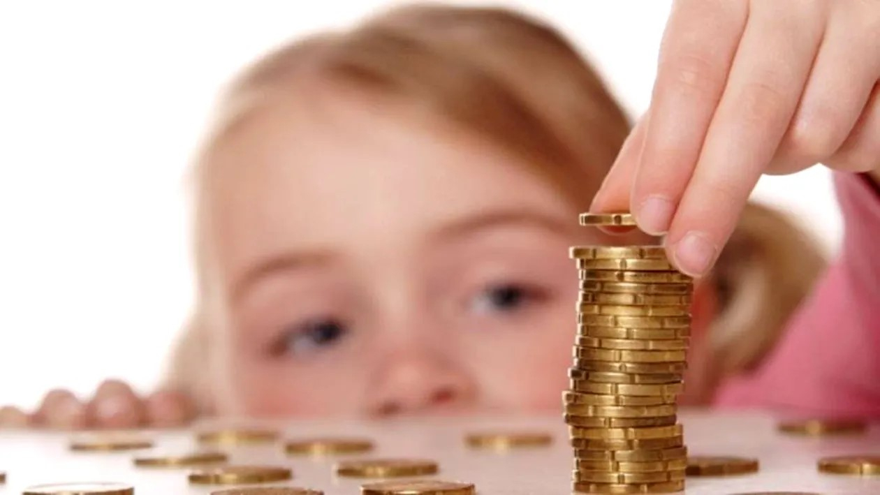 Alocațiile pentru copii, plătite înainte de începerea școlii